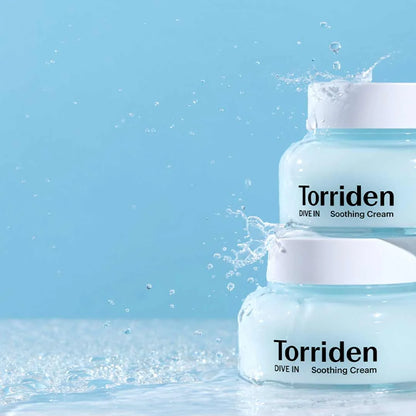Torriden Dive In Soothing Cream displayed with refreshing splashes of water, showcasing its hydrating formula.